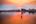 a person fishing in a lake