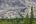 a white building on a hill
