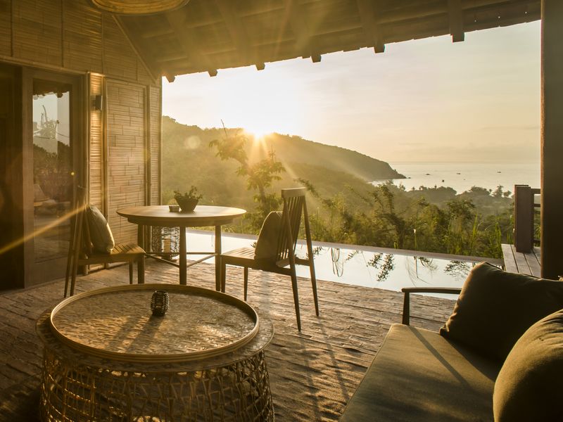 Infinity pool from open living area at Zannier Bai San Ho
