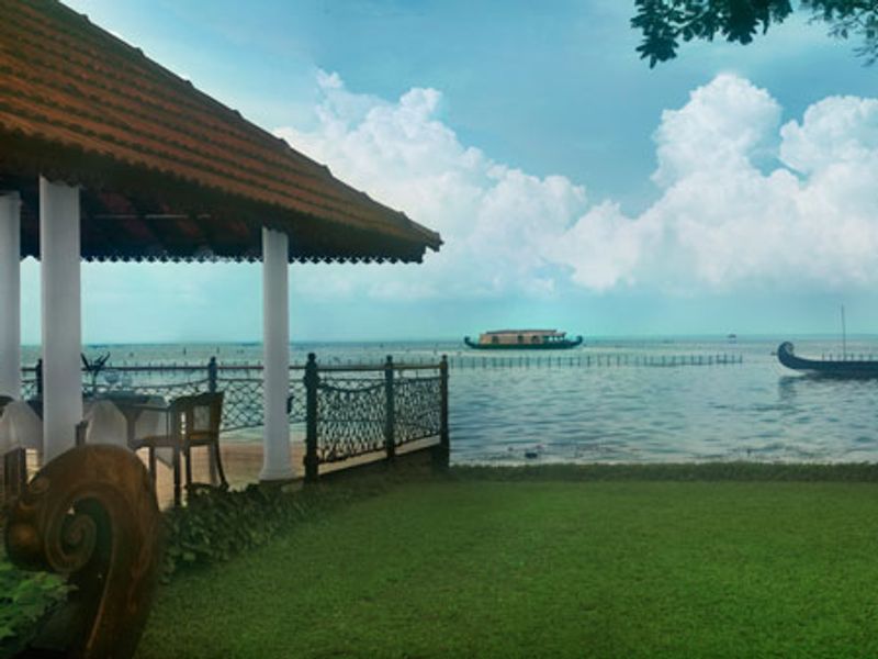Bar overlooking lake at Kumarakom Lake Resort