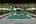 Swimming pool and loungers at Aravinda Resort