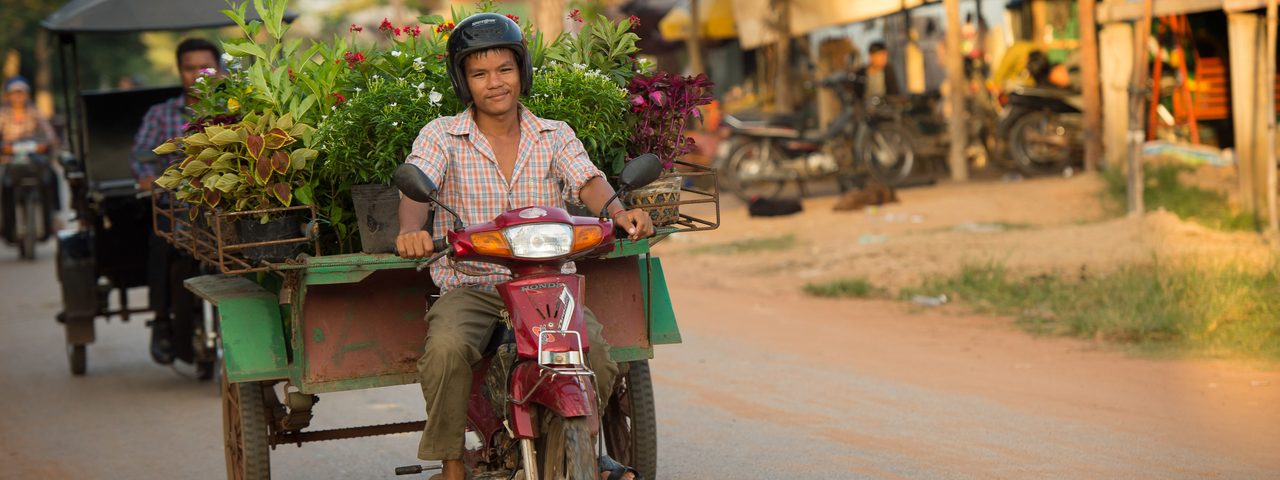 Boys on bikes in Cambodia
