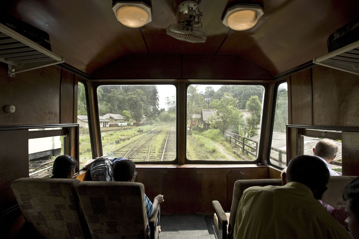 Travellers in observation carriage on train