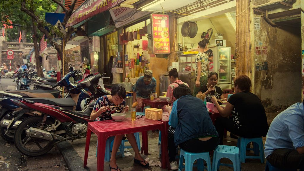 Woman eating noodles