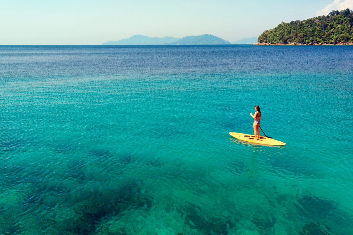 Woman on a paddleboard Borneo