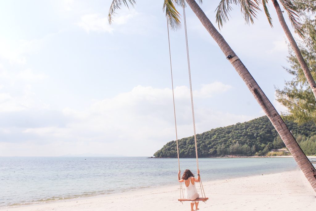 woman on swing on koh russey