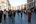 a group of people walking on a street