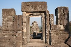 a stone doorway with a stone structure