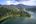a aerial view of a lake surrounded by trees
