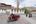 a man riding a motorcycle in a town