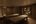 a room with tables and shelves