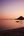 a boat on the water at sunset
