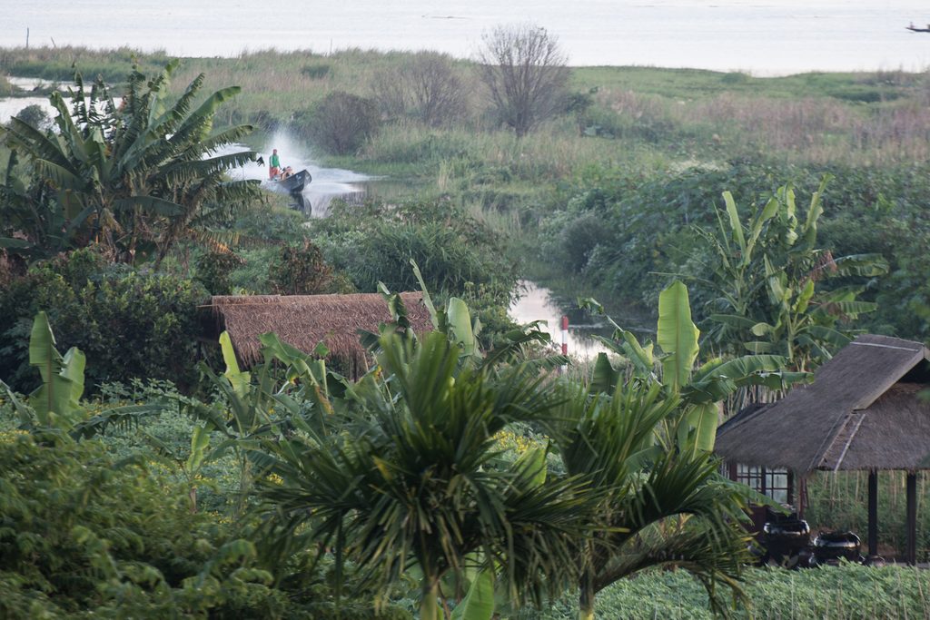 man on boat in inle lake