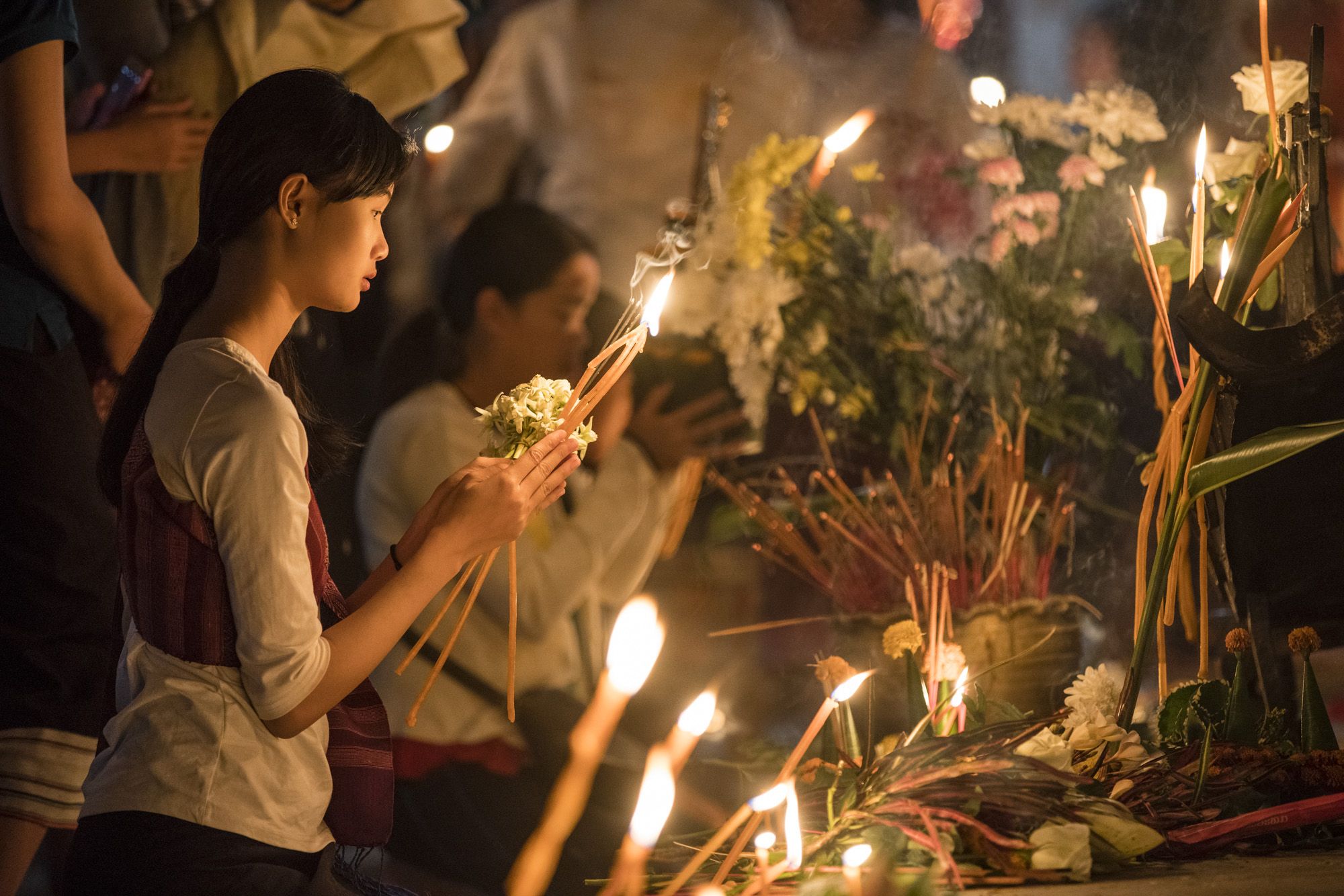 alms giving laos