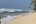 a person fishing on a beach