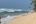 a person fishing on a beach