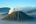 a mountain with smoke coming out of it