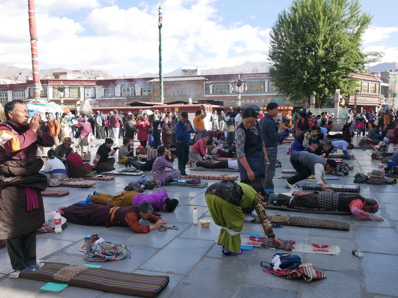 Praying at the Jongkham Palace in Lhasa, Tibet