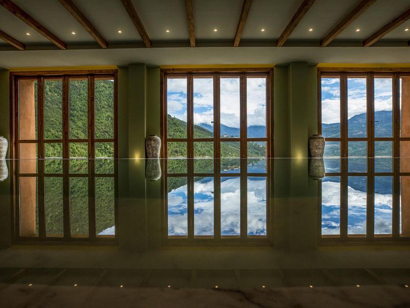 Swimming pool overlooking mountains at Bhutan Spirit Sanctuary