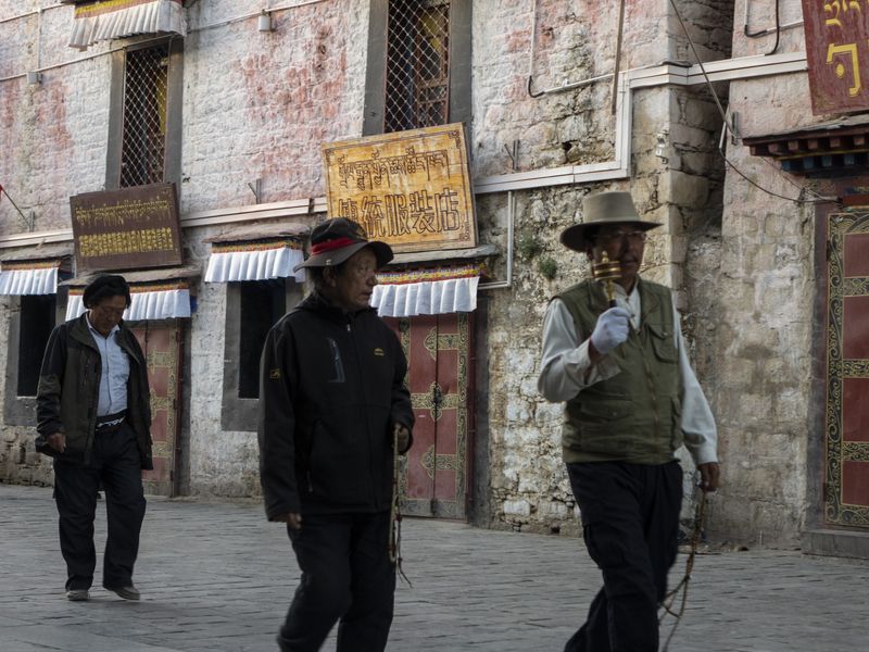 Devotees at the Jongkham Palace in Lhasa, Tibet
