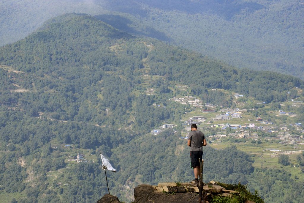 Man on top of mountain