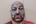 a man with a grey mask on his face