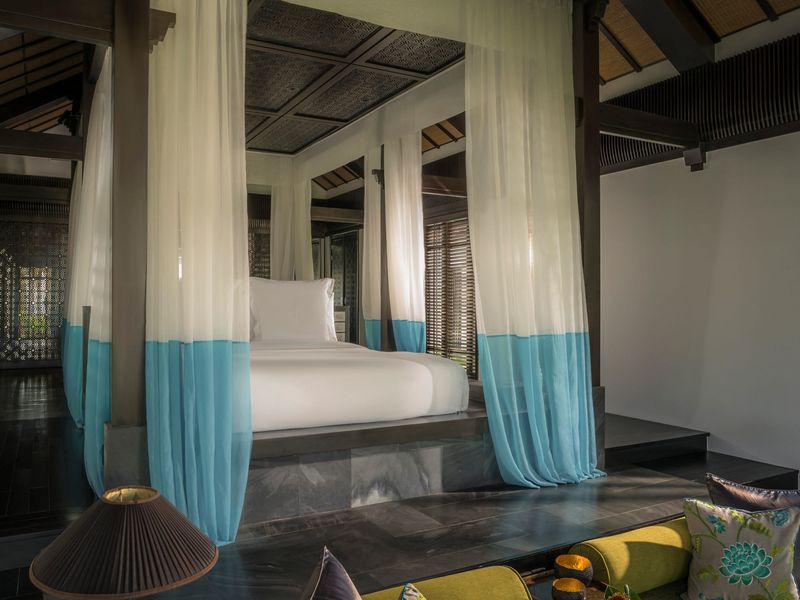 Four-poster bed at Four Seasons Nam Hai Hoi An
