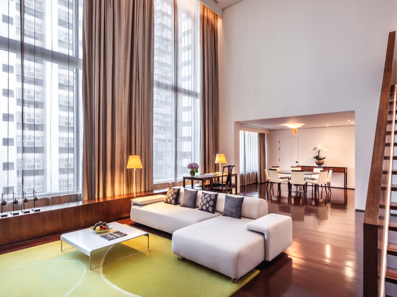 Suite with large windows at Como Metropolitan Bangkok