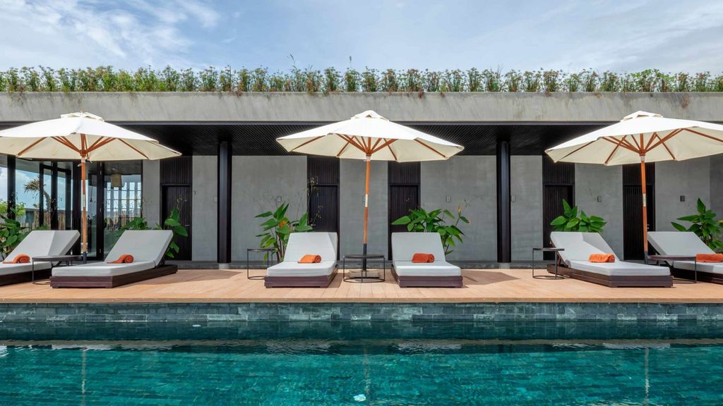 Outdoor pool & terrace at Amber Kampot