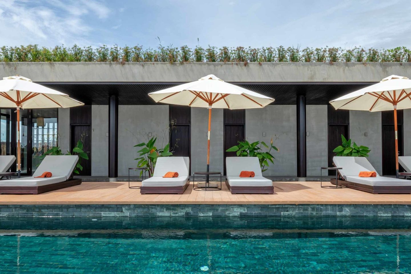 Outdoor pool & terrace at Amber Kampot